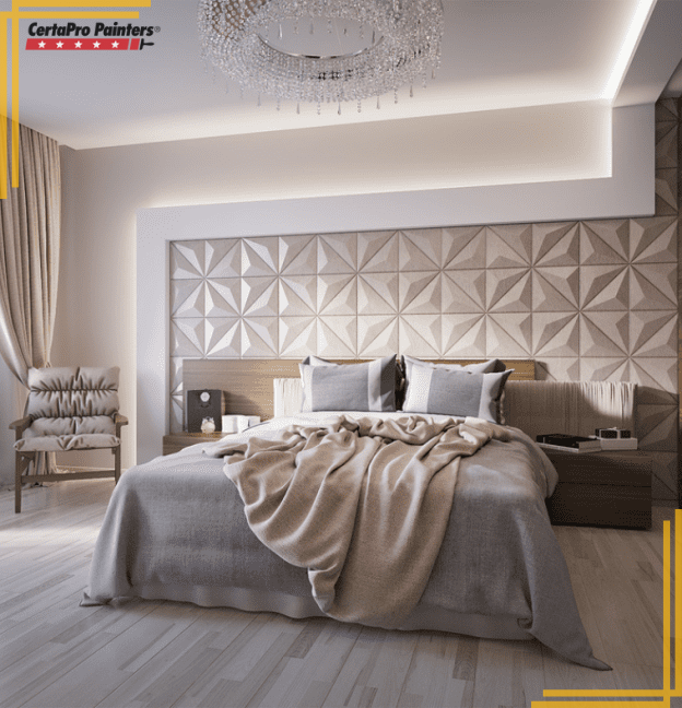 bedroom with king bed and textured accent wall