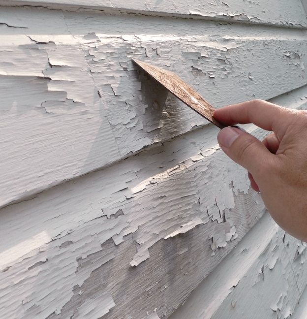 repairing wood siding home exterior
