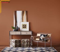 chair and desk against cavern clay wall