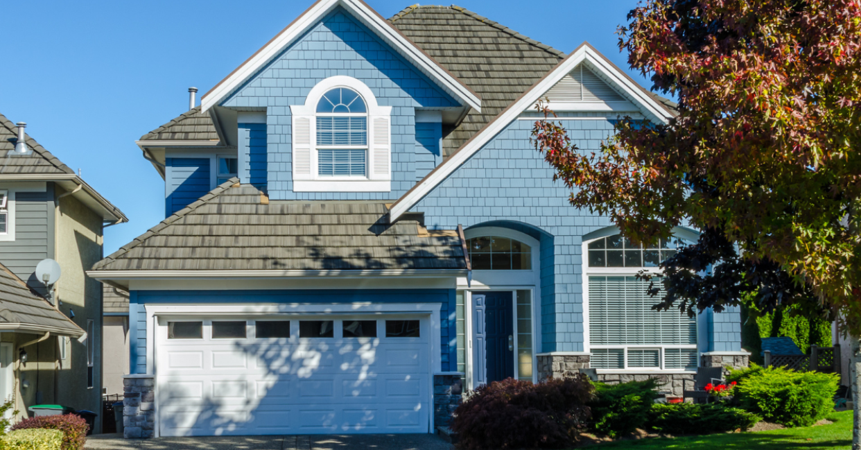 blue painted house for sale