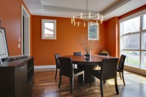 Residential dining room with a circular dining table with six chairs