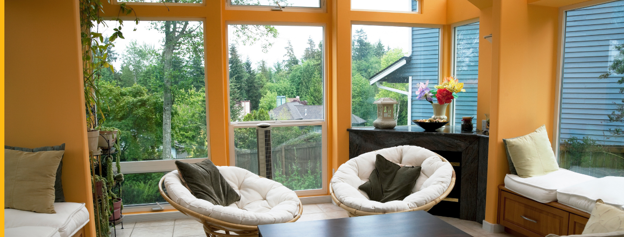 Sunroom with yellow painted wall interiors