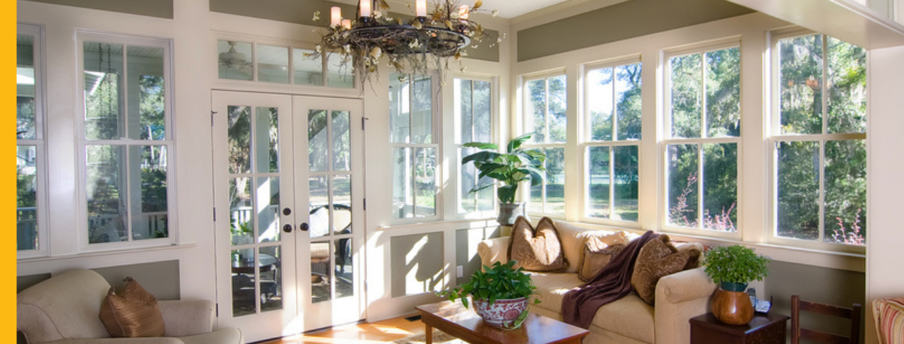 Sunroom with light green painted wall interiors