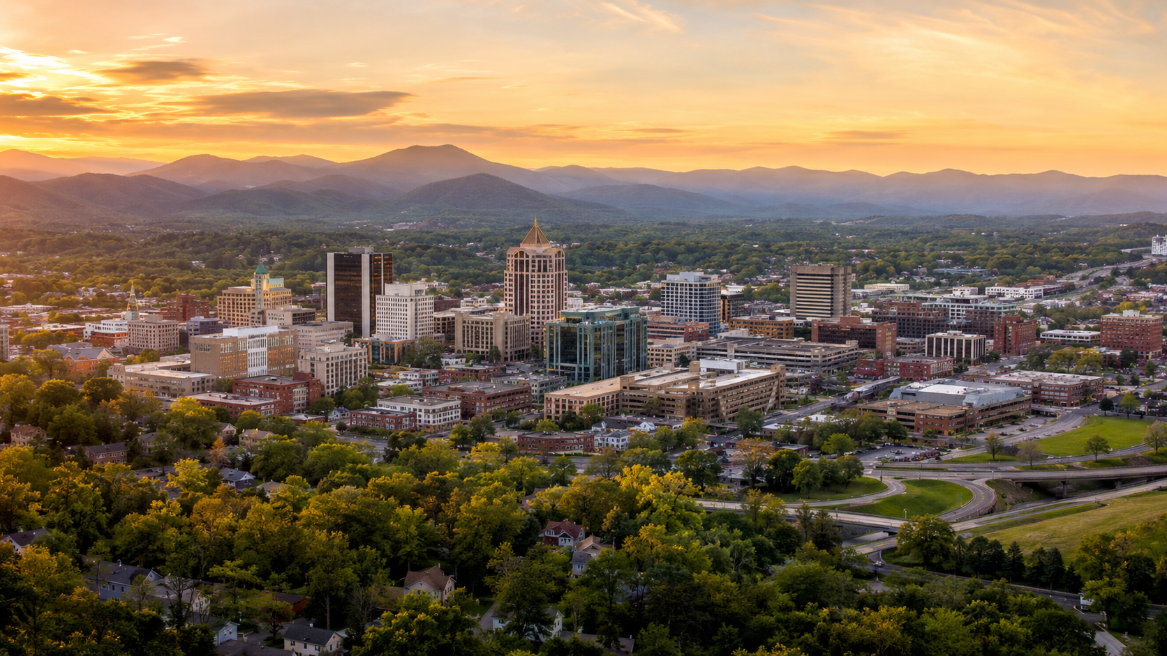 Downtown Roanoke, Virginia, with the Blue Ridge Mountains at sunset