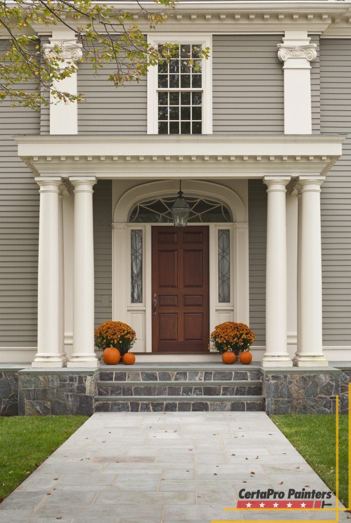 beige house brown front door