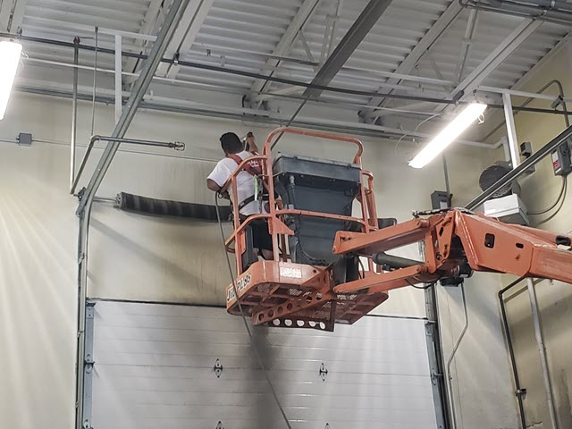 photo of 18 wheeler truck bay before new coating