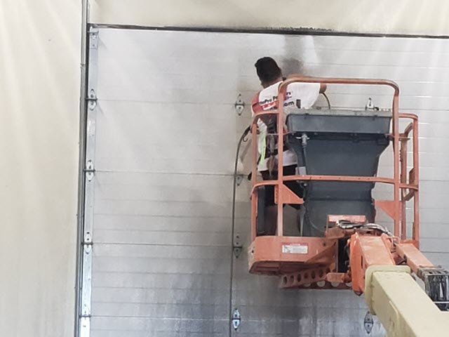 photo of 18 wheeler truck bay before new coating