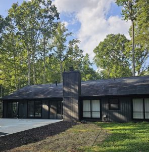 black exterior house painting project in alpharetta