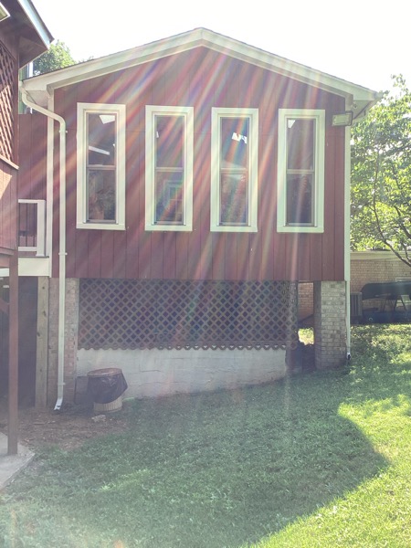 back section of home before being repainted