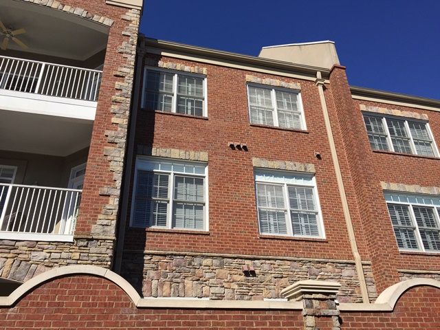 house with brown bricks