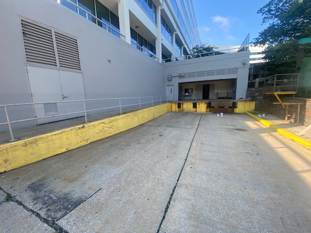 Office Building Commercial Painting – Loading Dock Before