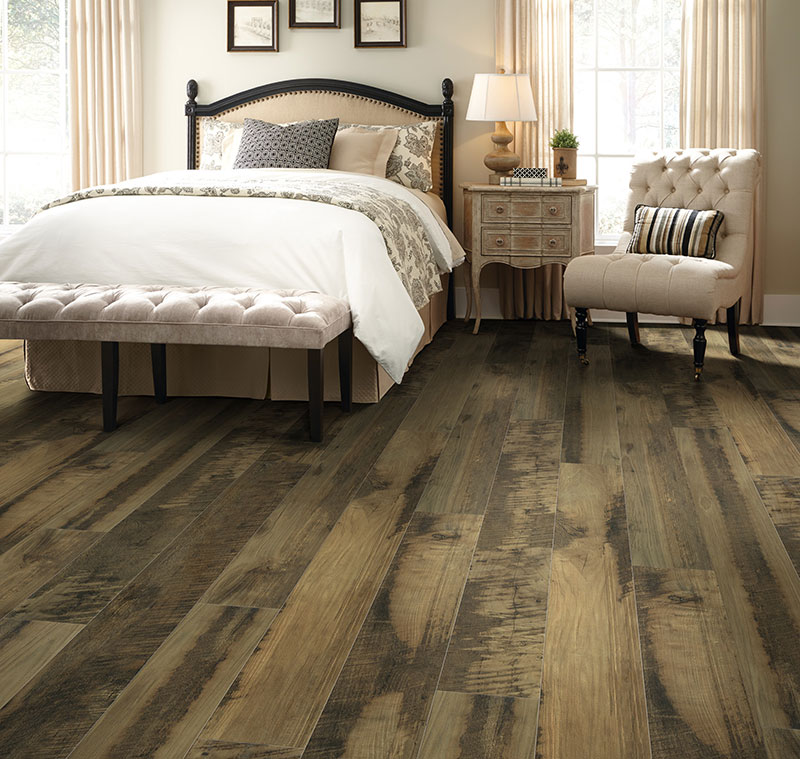 bedroom with laminate flooring