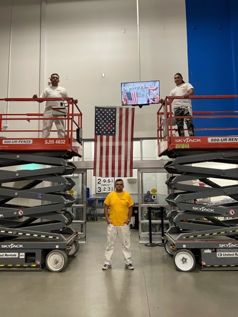 Jonathan Gutierrez and his team on scissor lifts