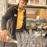 staff pouring champagne