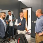 group of men talking