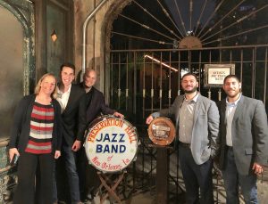 certapro posing around jazz band sign
