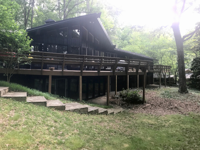 cabin after being repainting in sandy springs