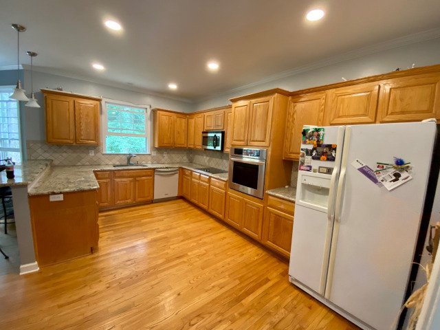 photo of cabinets before being repainted in sandy springs, georgia