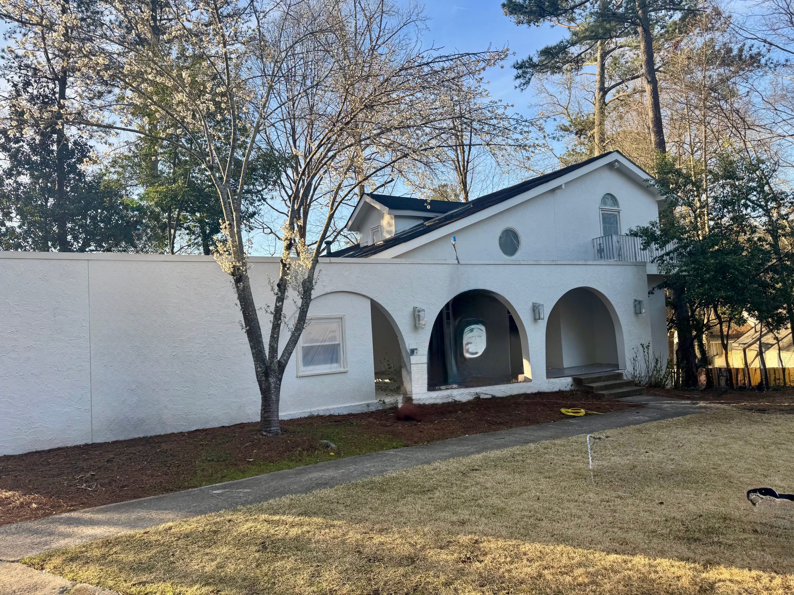 exterior of home in sandy springs before getting repainted