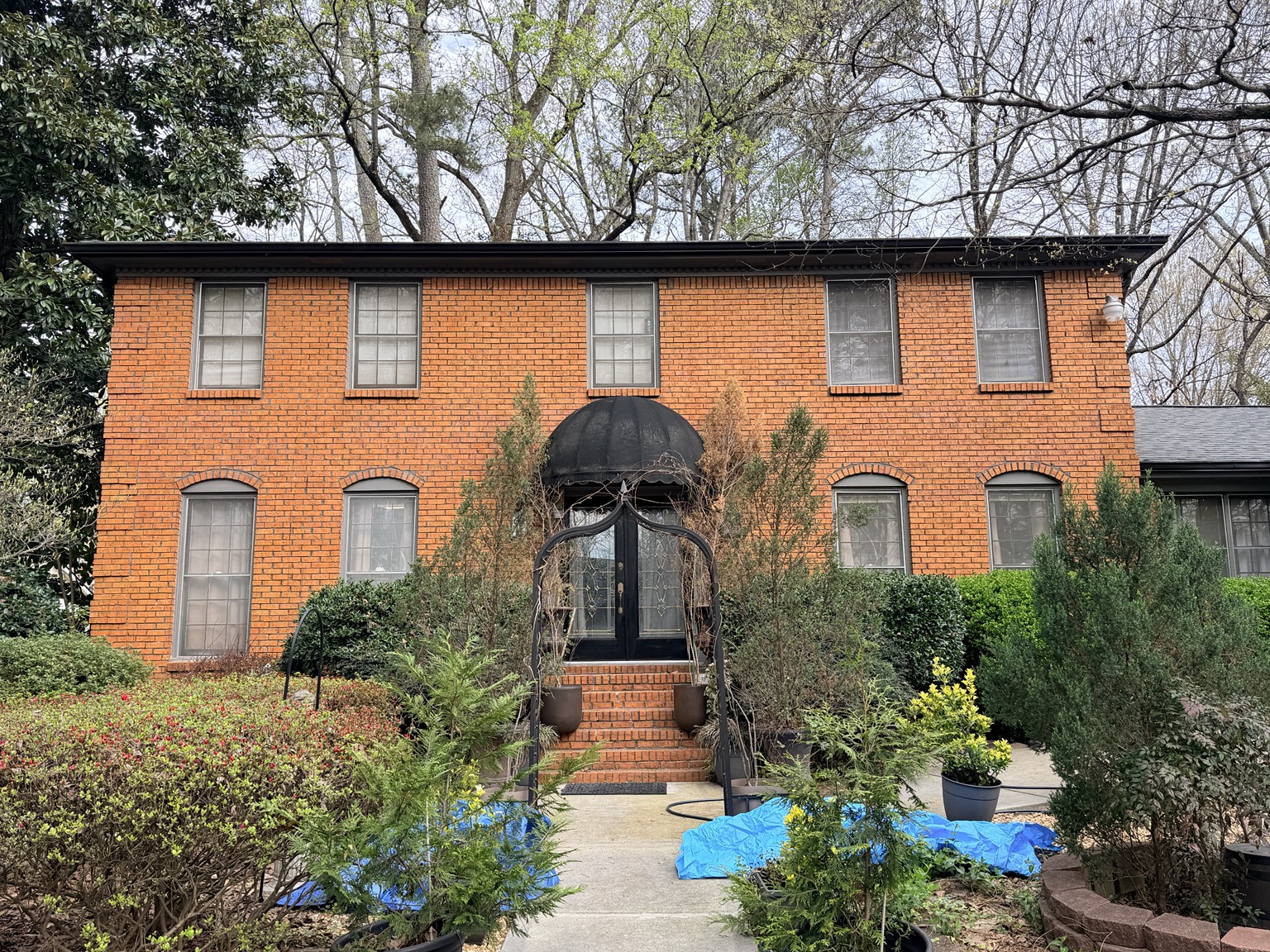 brick home in dunwoody before being painted