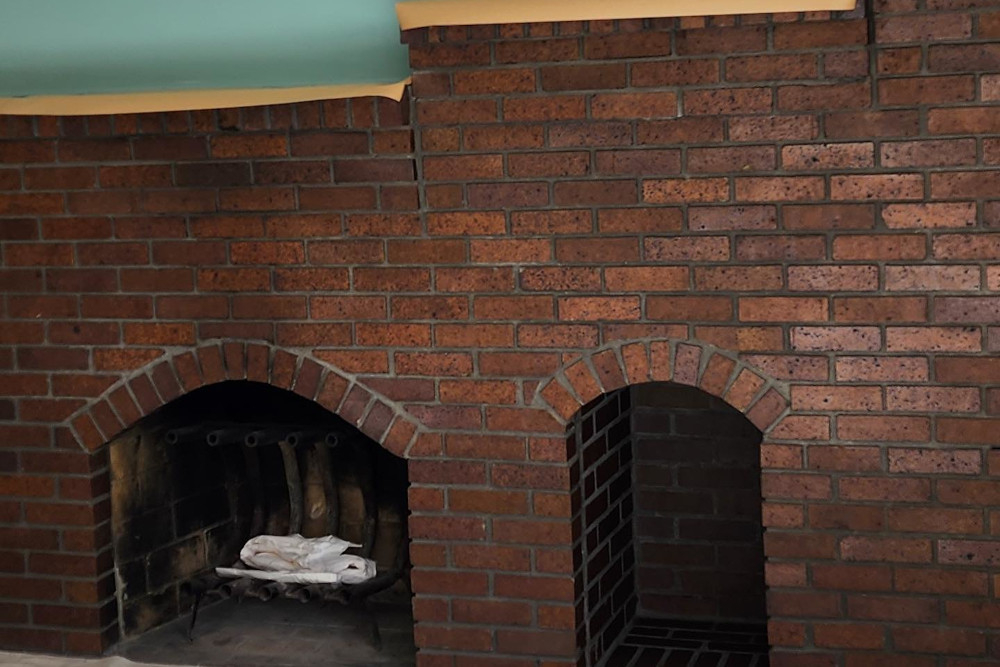 Whitewashed Fireplace Before