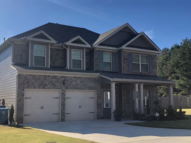 photo of repainted brick home in loganville