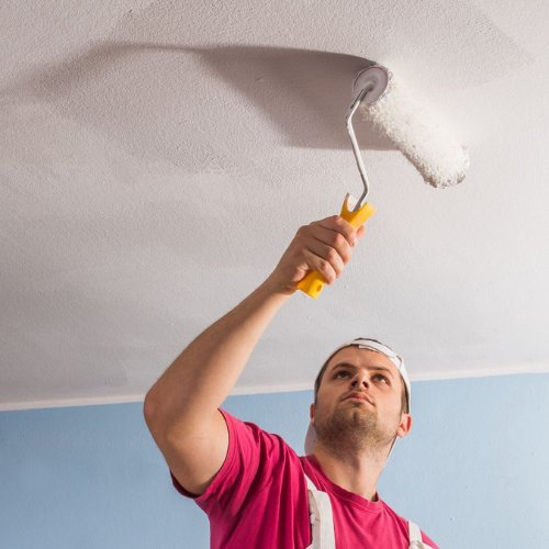 certapro painter team member painting ceiling