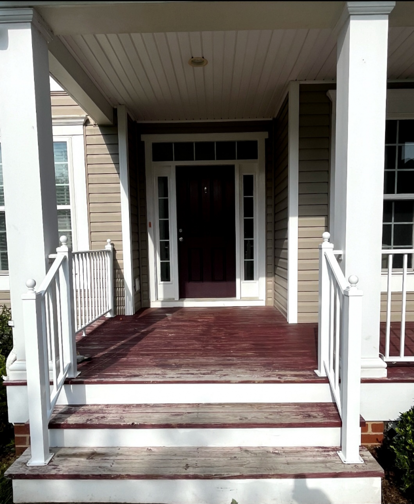front porch with worn paint