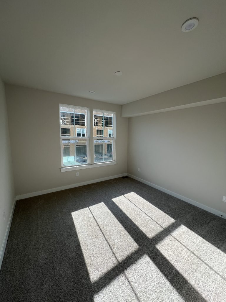 empty bedroom interior with white walls before repaint