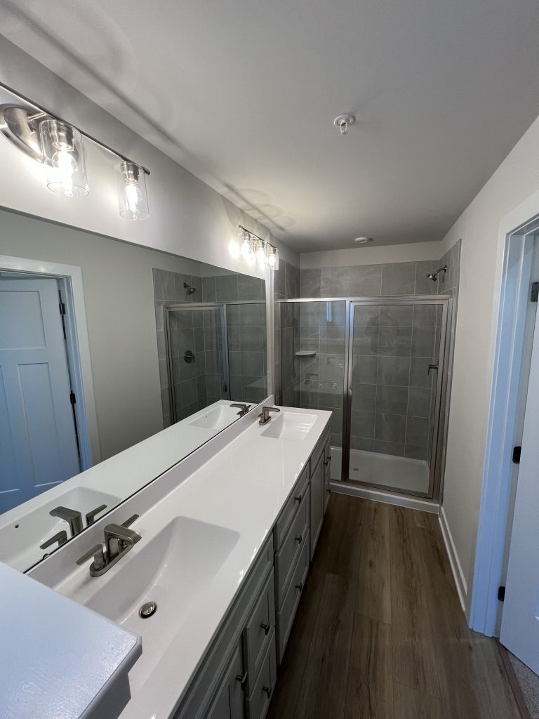 master bathroom interior with white walls