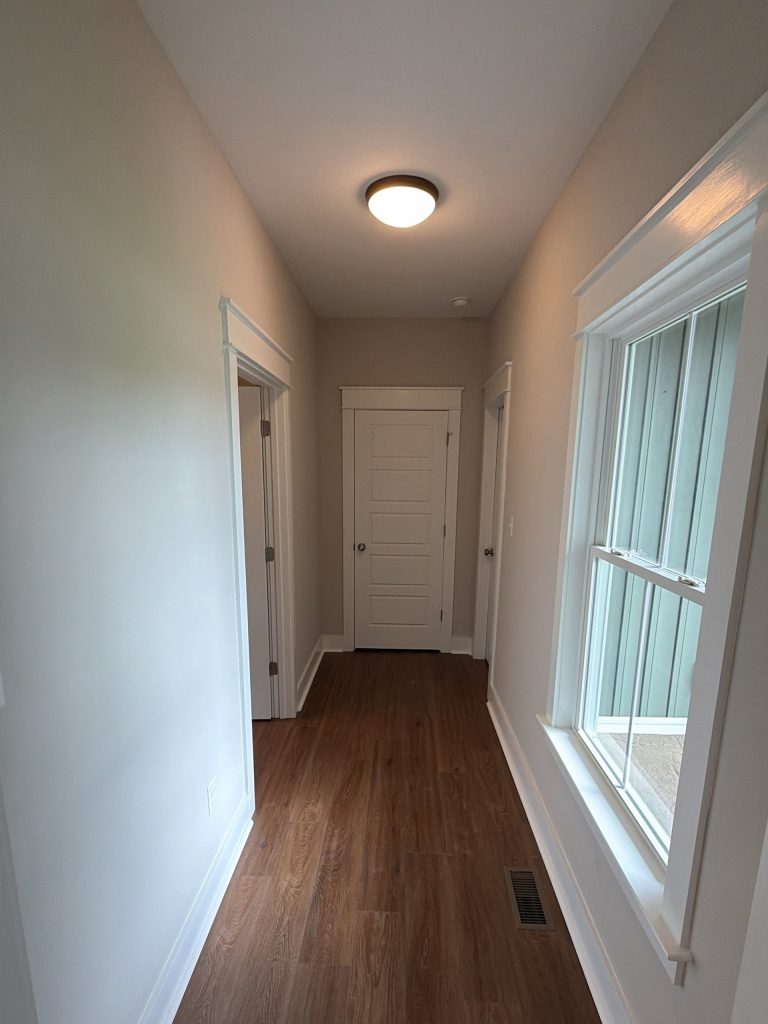 home interior off-white hallway before repaint