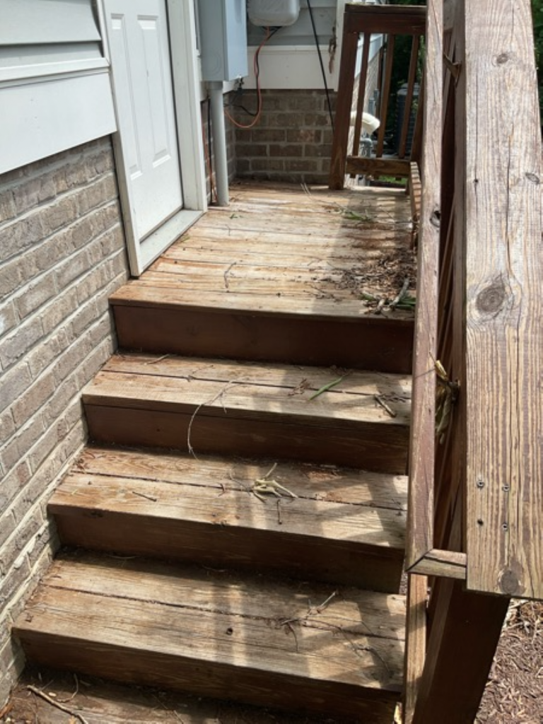 wooden outdoor staircase before restain