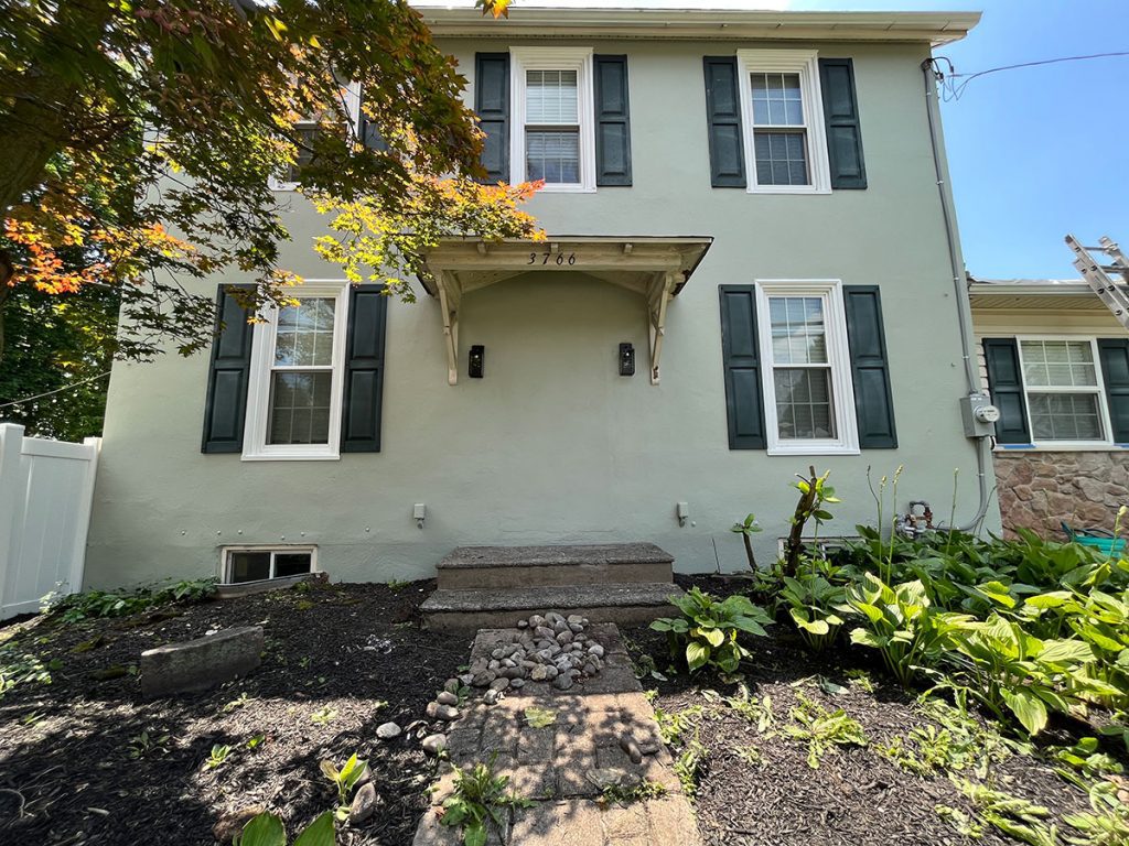 stucco exterior painting (front) after