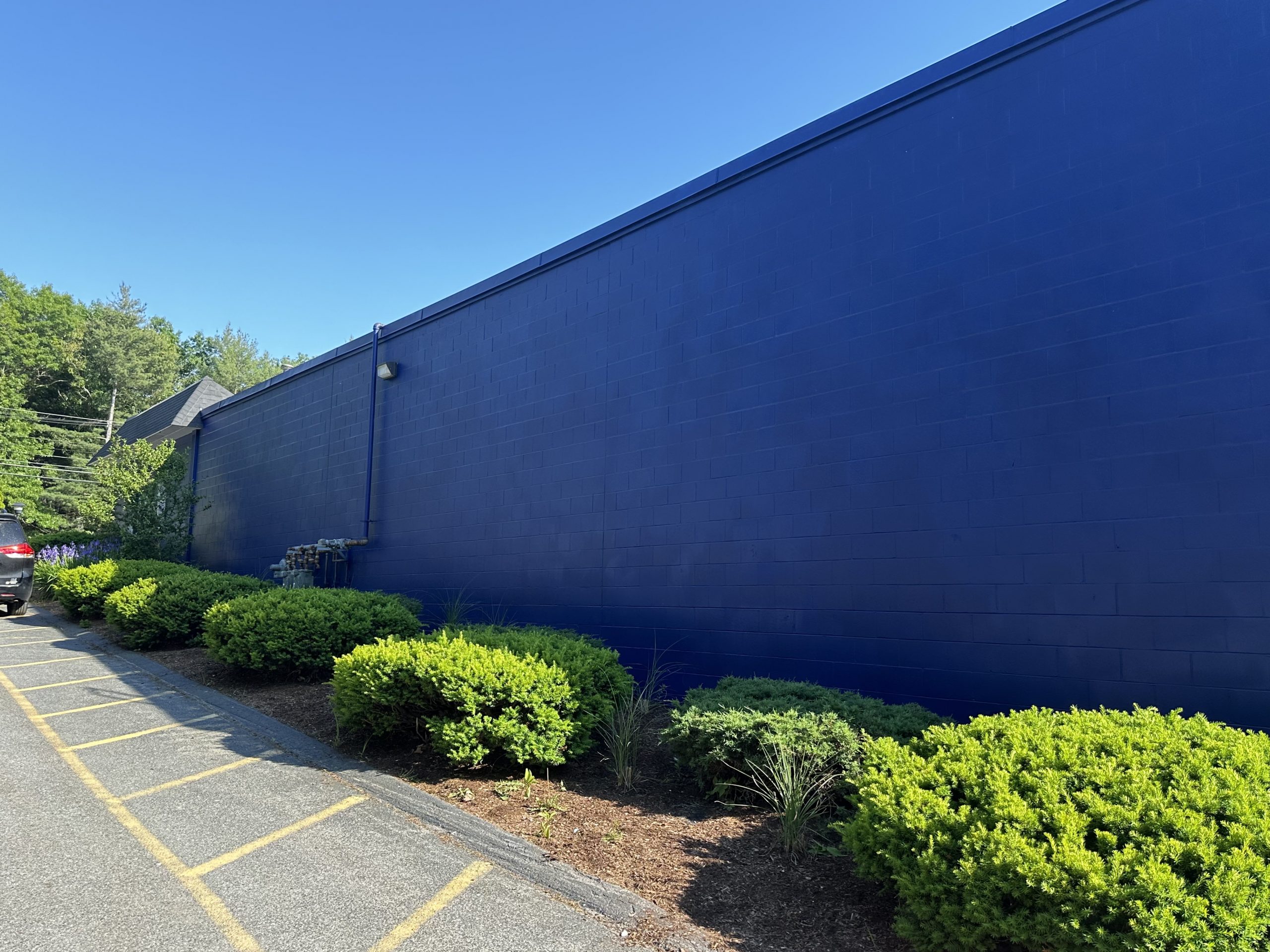 blue commercial building in westford, ma - angle 2