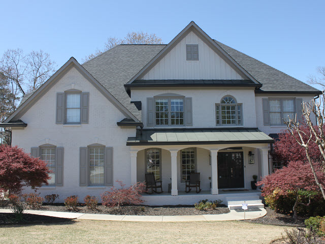 photo of repainted brick home in alpahretta