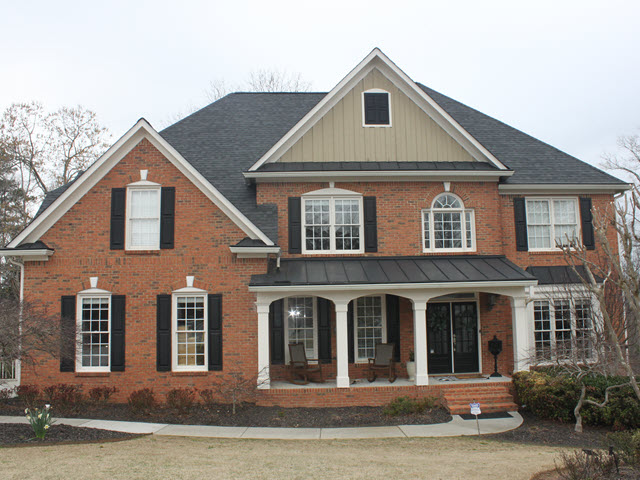 photo of brick house to be repainted