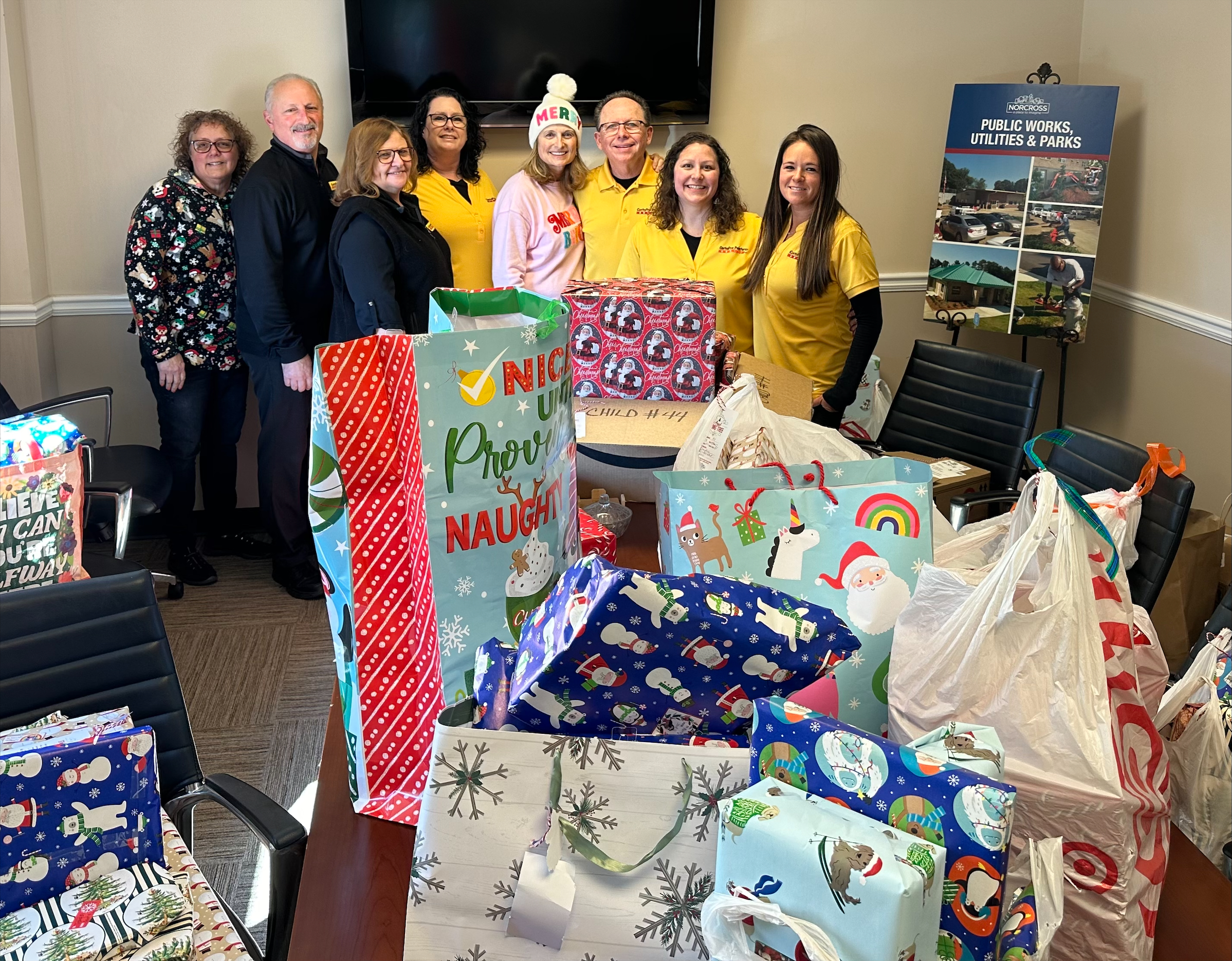 gift wrapping event for mayor's angel giving tree