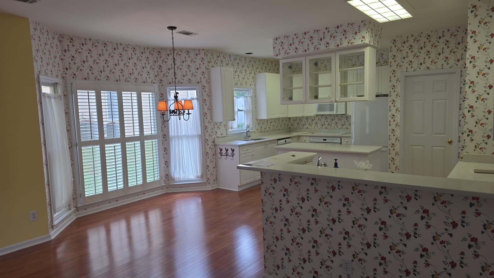 kitchen area of home before being repainted