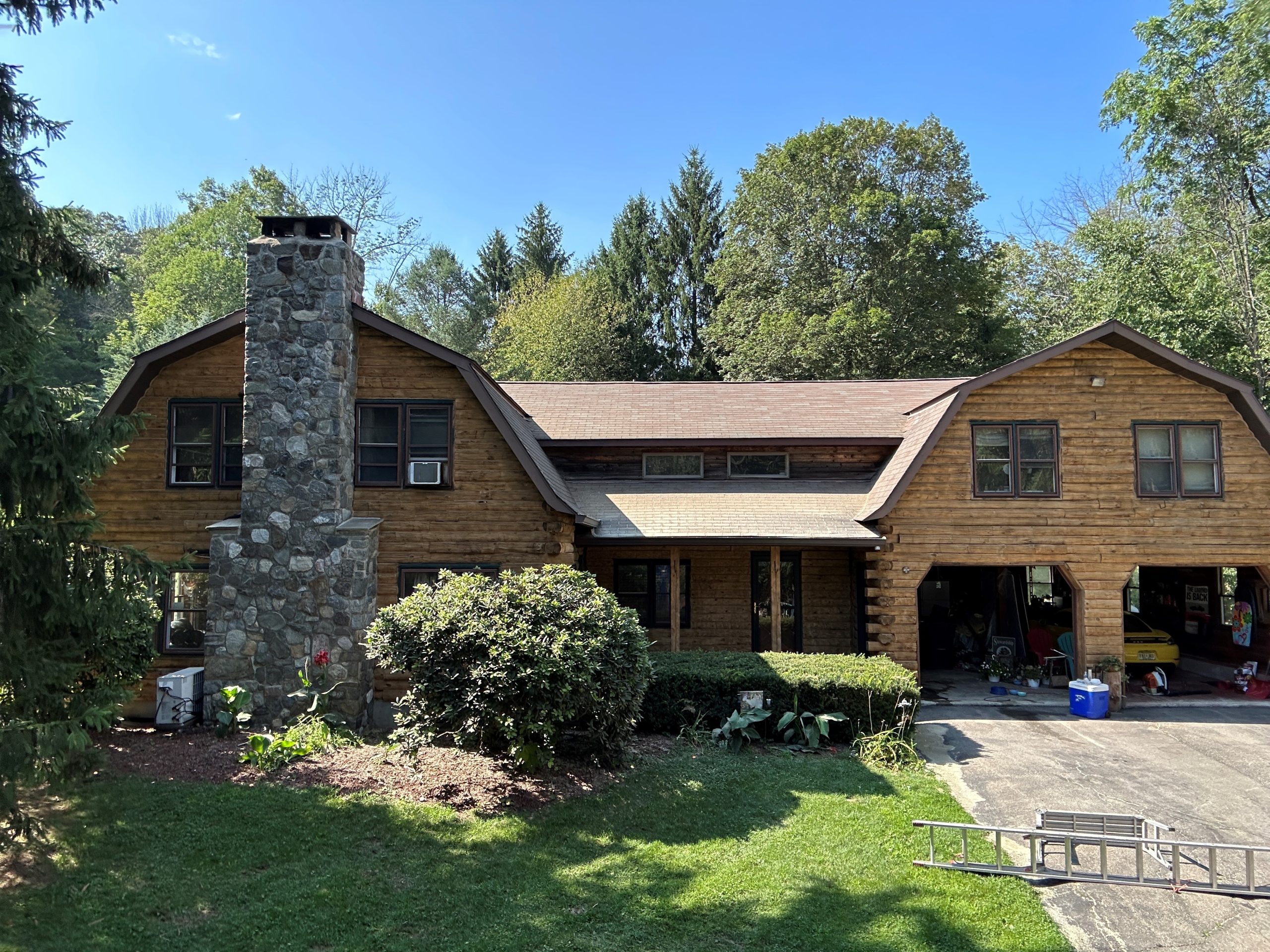 Log Cabin Home in Warwick, NY after completed residential staining project by CertaPro Painters of Orange County, NY