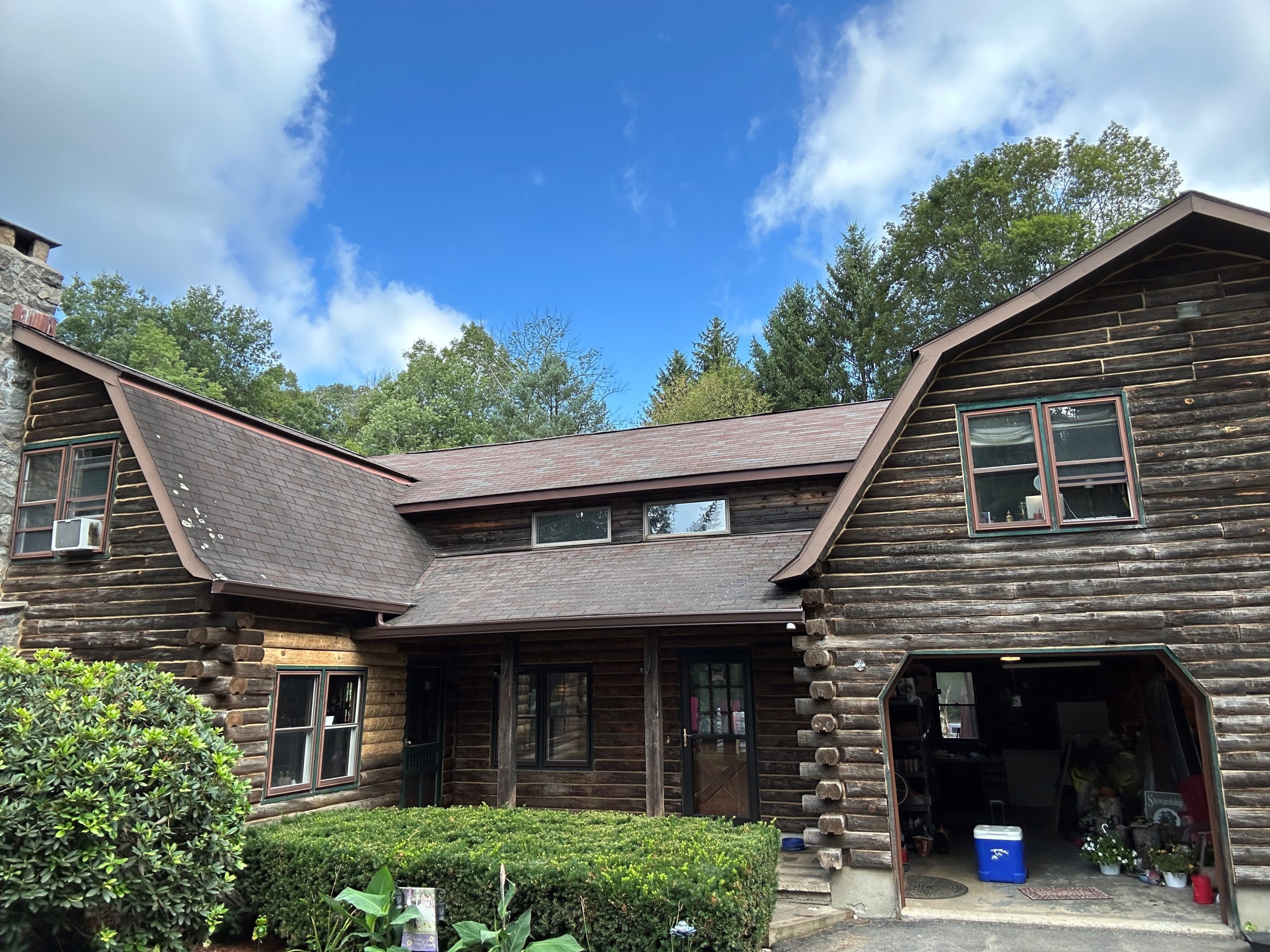 Log Cabin Home in Warwick, NY before residential staining project by CertaPro Painters of Orange County, NY