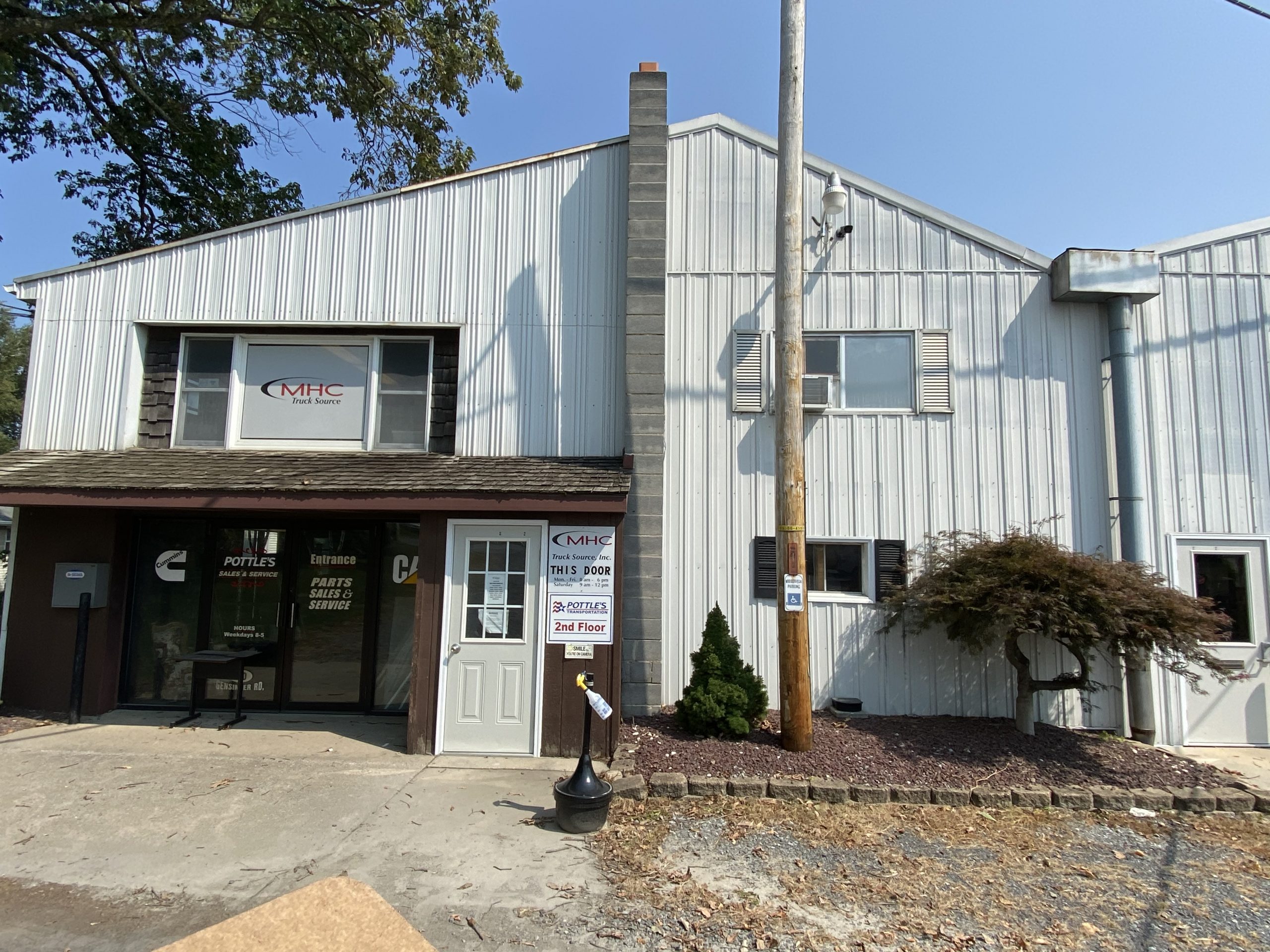 Pottle's Transportation before exterior painting project by CertaPro Painters of Quakertown - Angle 2