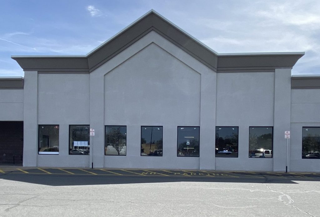 Freshly painted white and grey cement and stucco