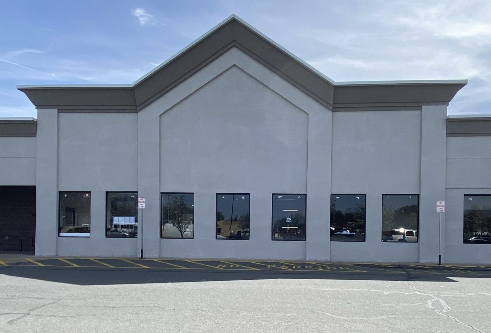 Freshly painted white and grey cement and stucco