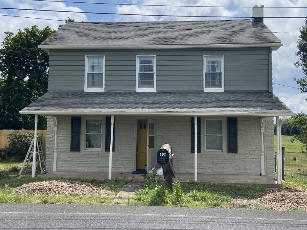 Greenish Grey Exterior Paint Job on house with grey roof