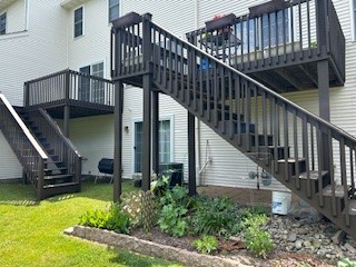 White with beige shutters Georgian Colonial home in Duxbury MA