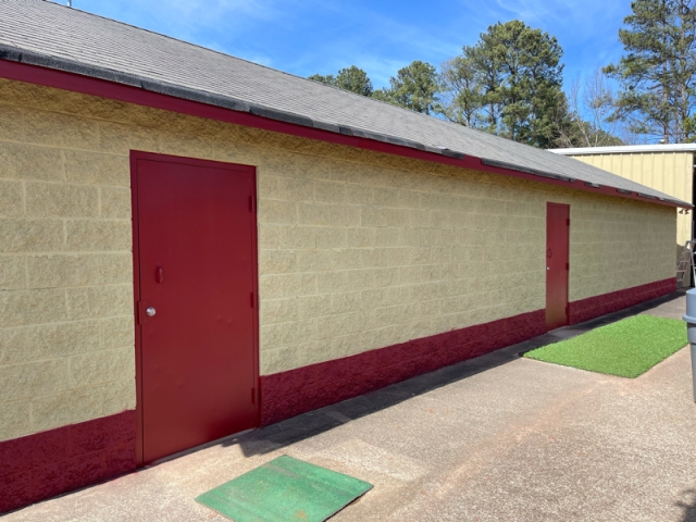 photo of lassiter high school's repainted football field house in mareietta ga