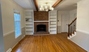 bookshelf and wainscoting painting