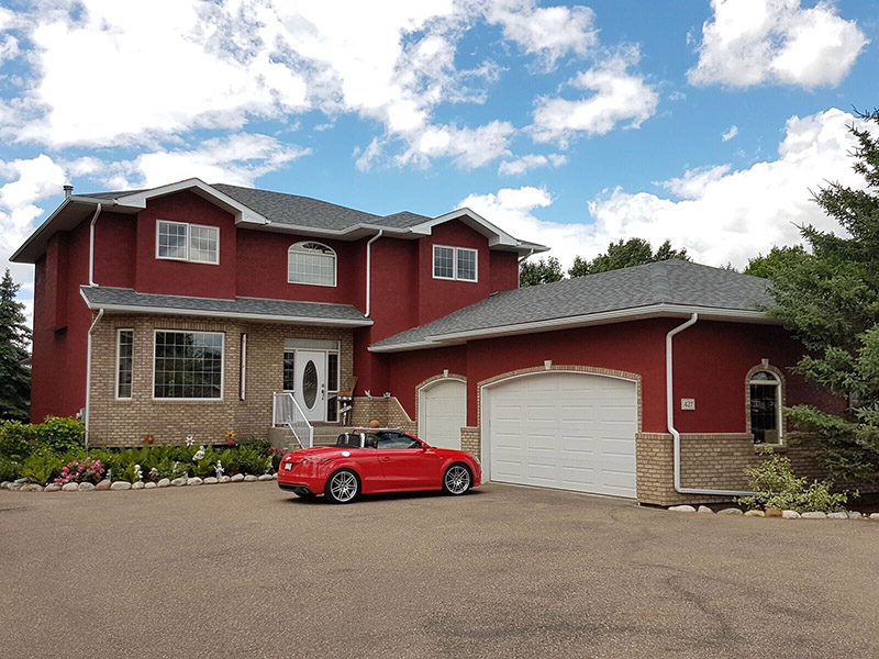 Exterior house painting by CertaPro Painters in Medicine Hat, AB