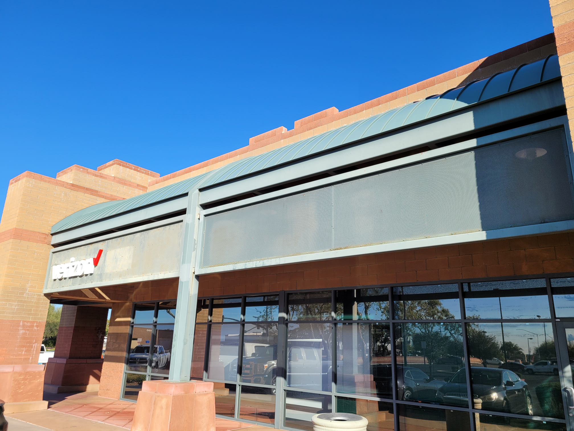 shopping center exterior painting before