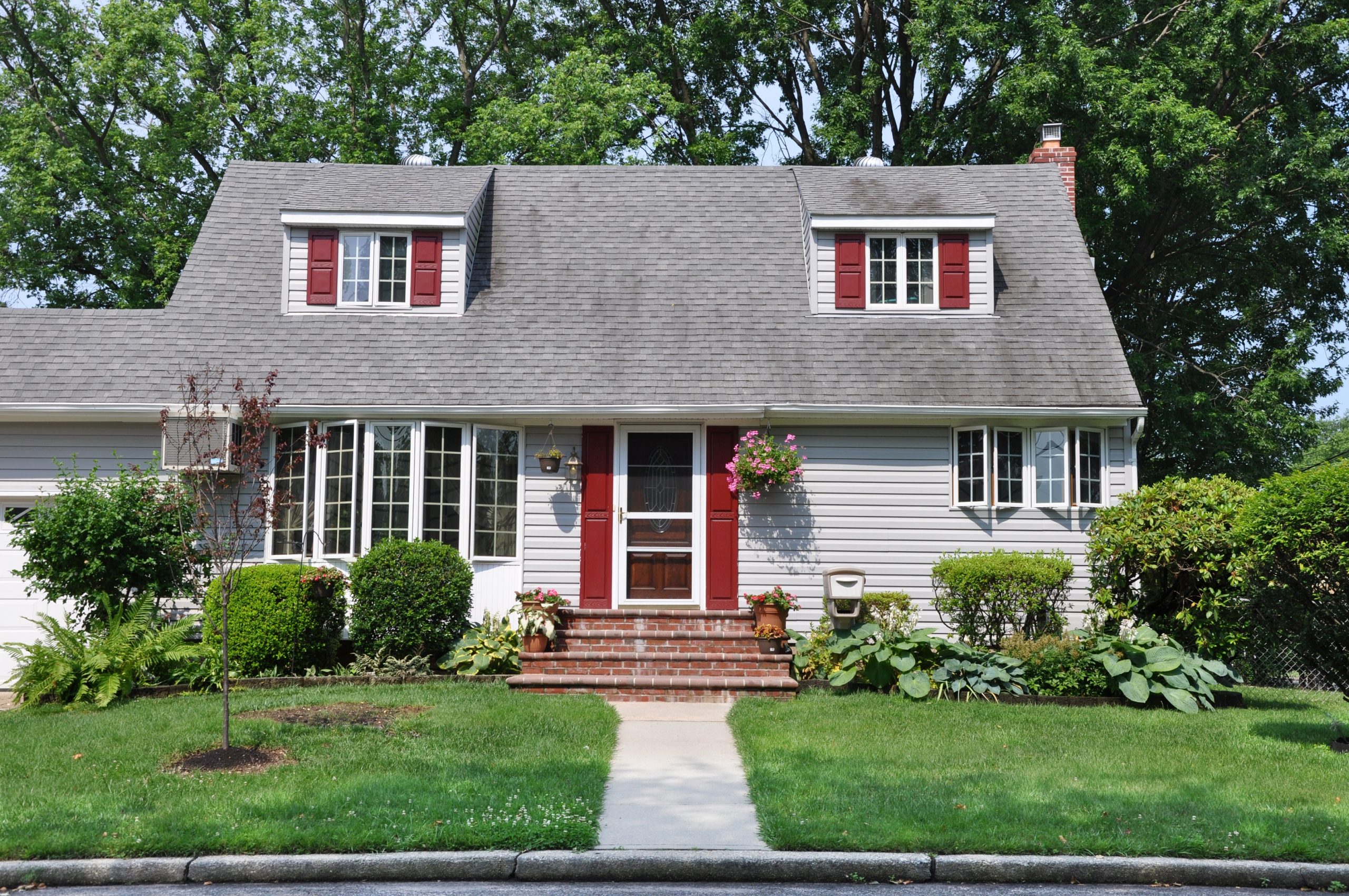 Grey House with Red Shutters